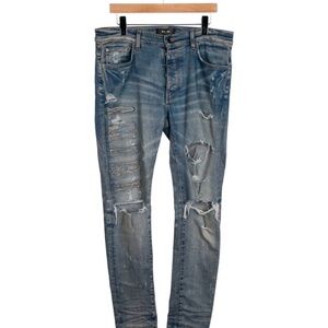 Amiri Distressed slim jeans